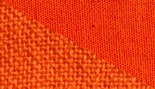 Fabric swatch dyed in blood orange, demonstrating the vibrant color achieved with our dye on different fabrics